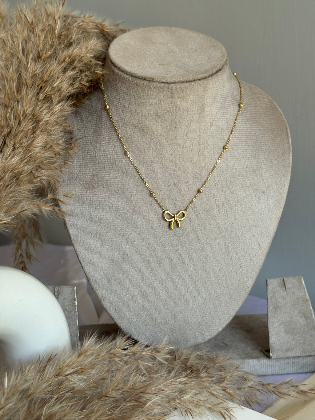 BOW NECKLACE